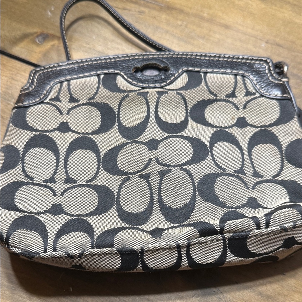 Coach Signature Black and Tan Clutch - Picture 3 of 5